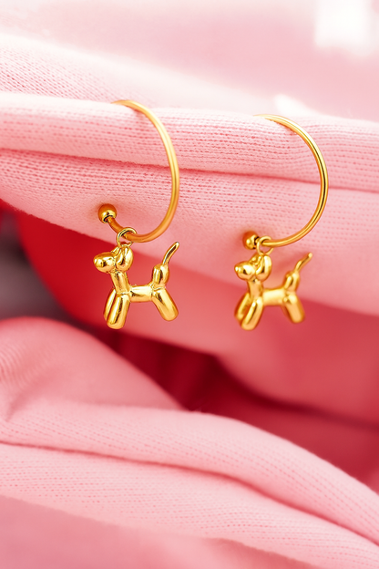 Gold dog-shaped earrings 
