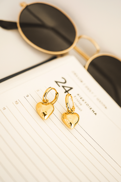 Gold heart-shaped earrings 