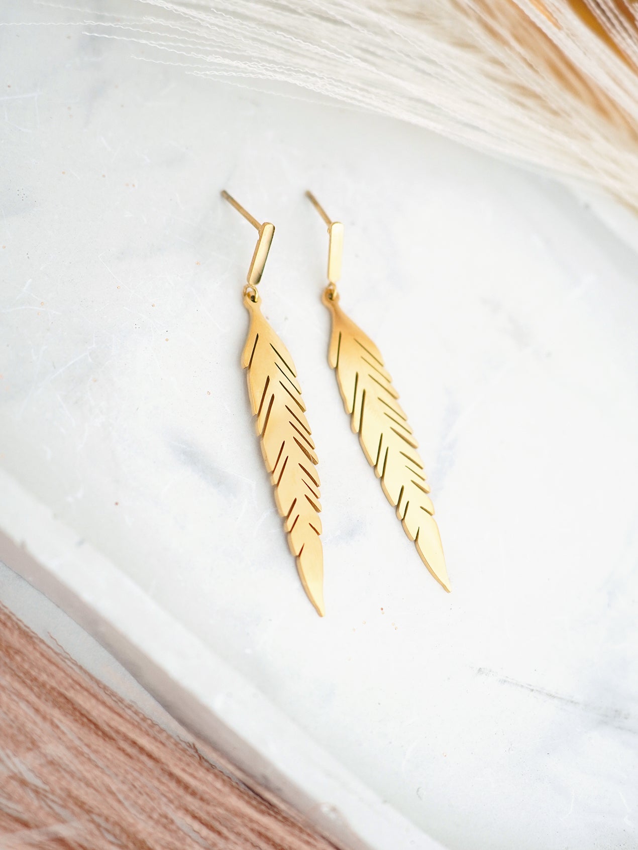 Stud earrings on a white background