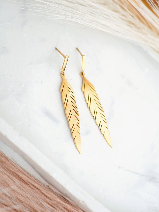 Stud earrings on a white background